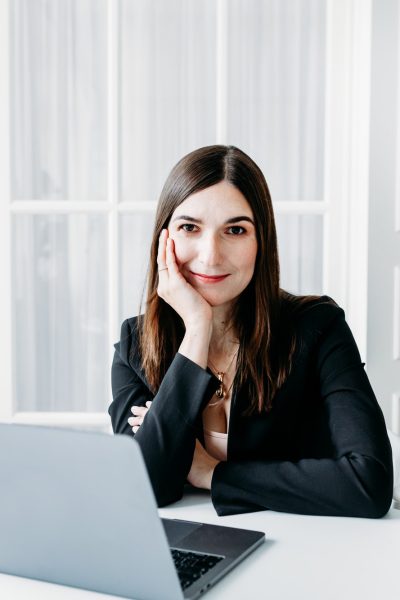 girl-in-dark-clothes-suit-working-on-a-laptop-lawyer-consultant-specialist-work-in-the-office-a.jpg